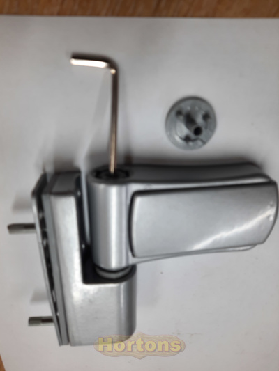 Adjust the clamp setting towards or away from the cabin door frame